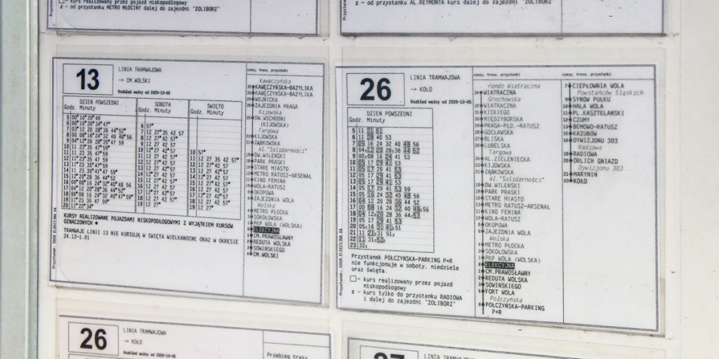 tram timetables distinguishing low-floor courses with a frame and high-floor courses with a dot